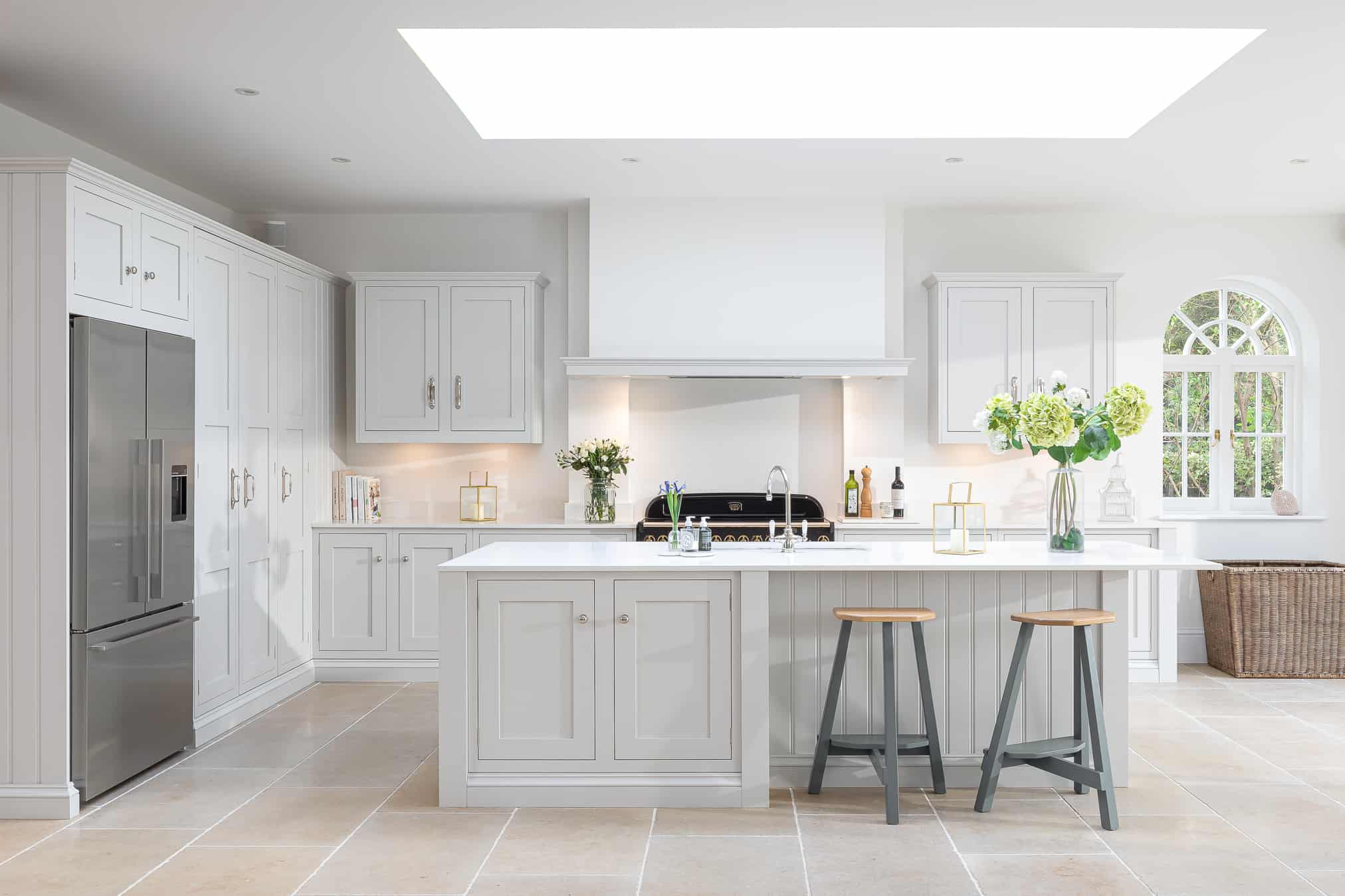 John Lewis of Hungerford luxury shaker kitchen in white with grey legged stools and white kitchen island