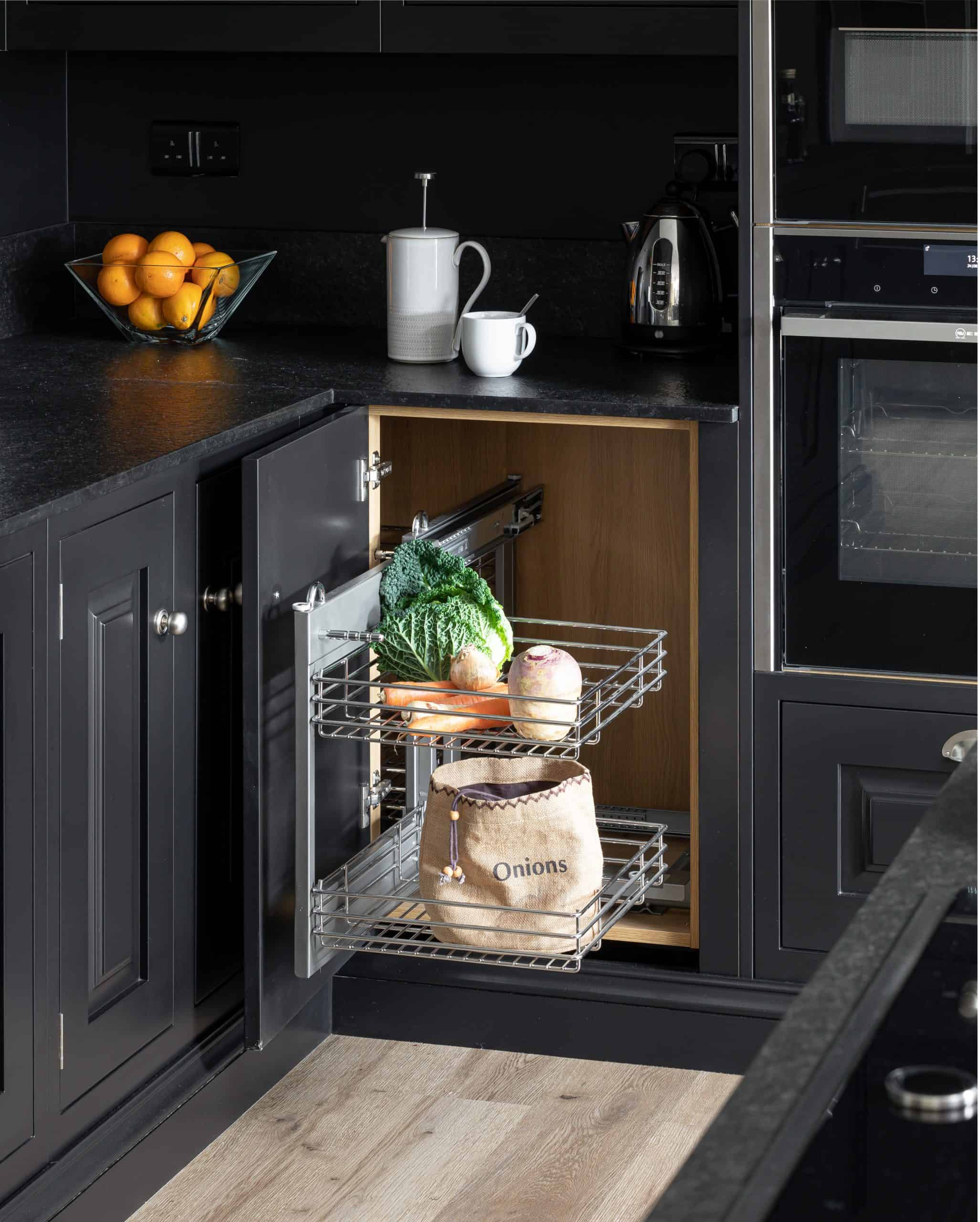 John Lewis of Hungerford bespoke artisan kitchen in black with hidden storage options