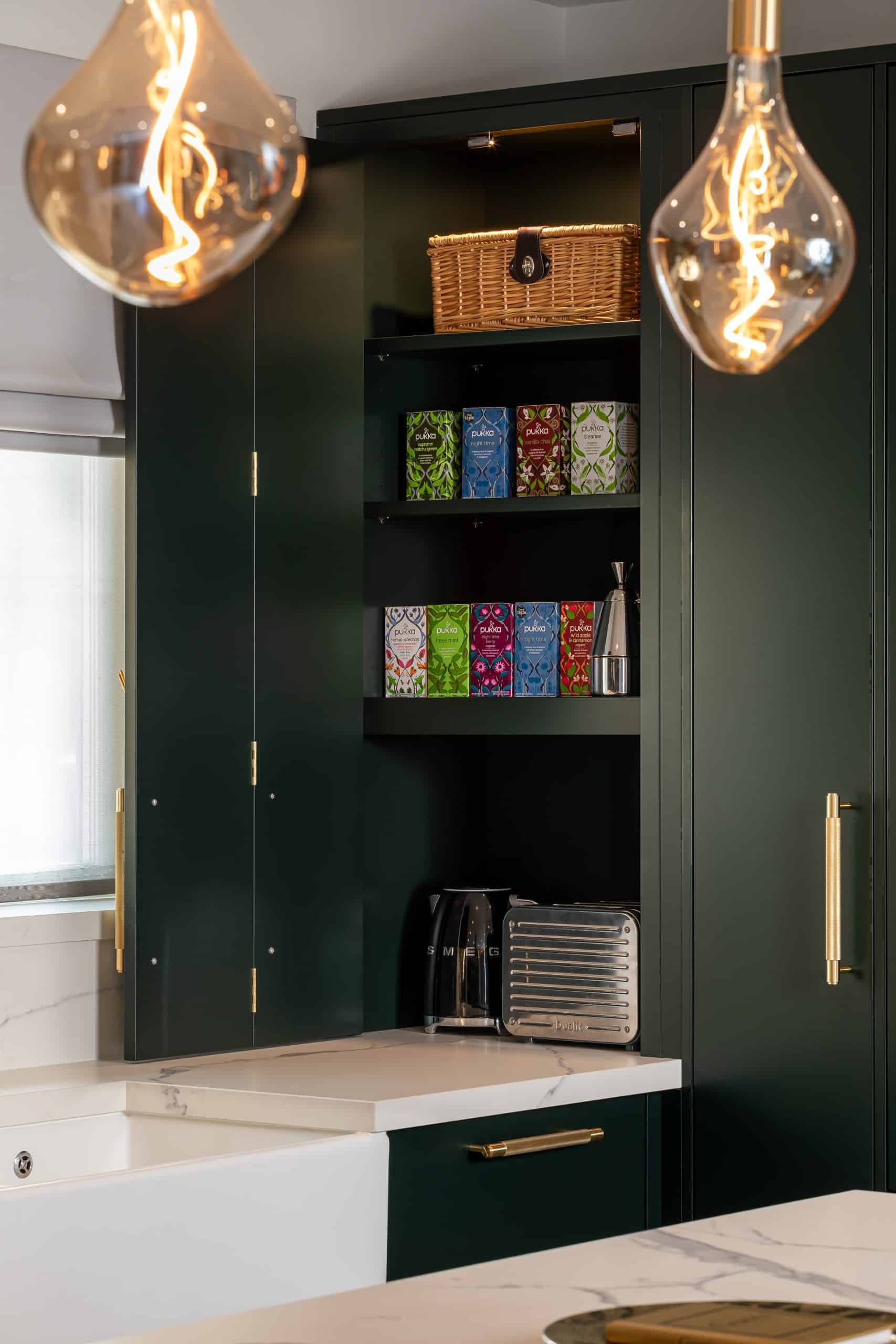 John Lewis of Hungerford urban bespoke contemporary kitchen in dark green with hidden storage options