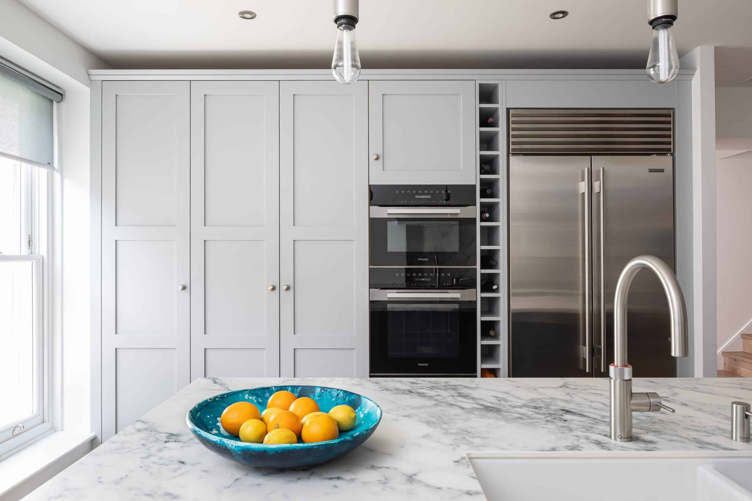 John Lewis of Hungerford bespoke luxury Shaker kitchen with grey cabinetry and marble worktops